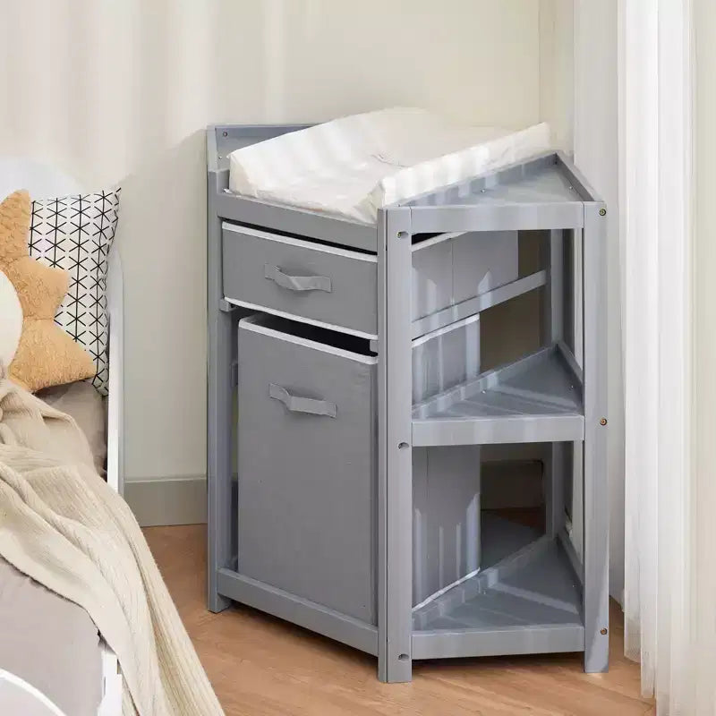 Table à langer d'angle compacte avec tiroir de rangement, panier à linge et matelas imperméable, meuble à langer moderne en bois pour chambre de bébé, gris